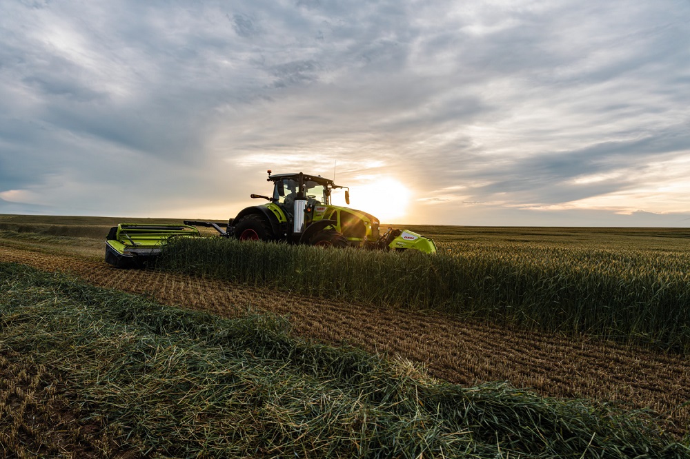 Claas Disco 9700 RC auto swather: behoedzaam kneuzen